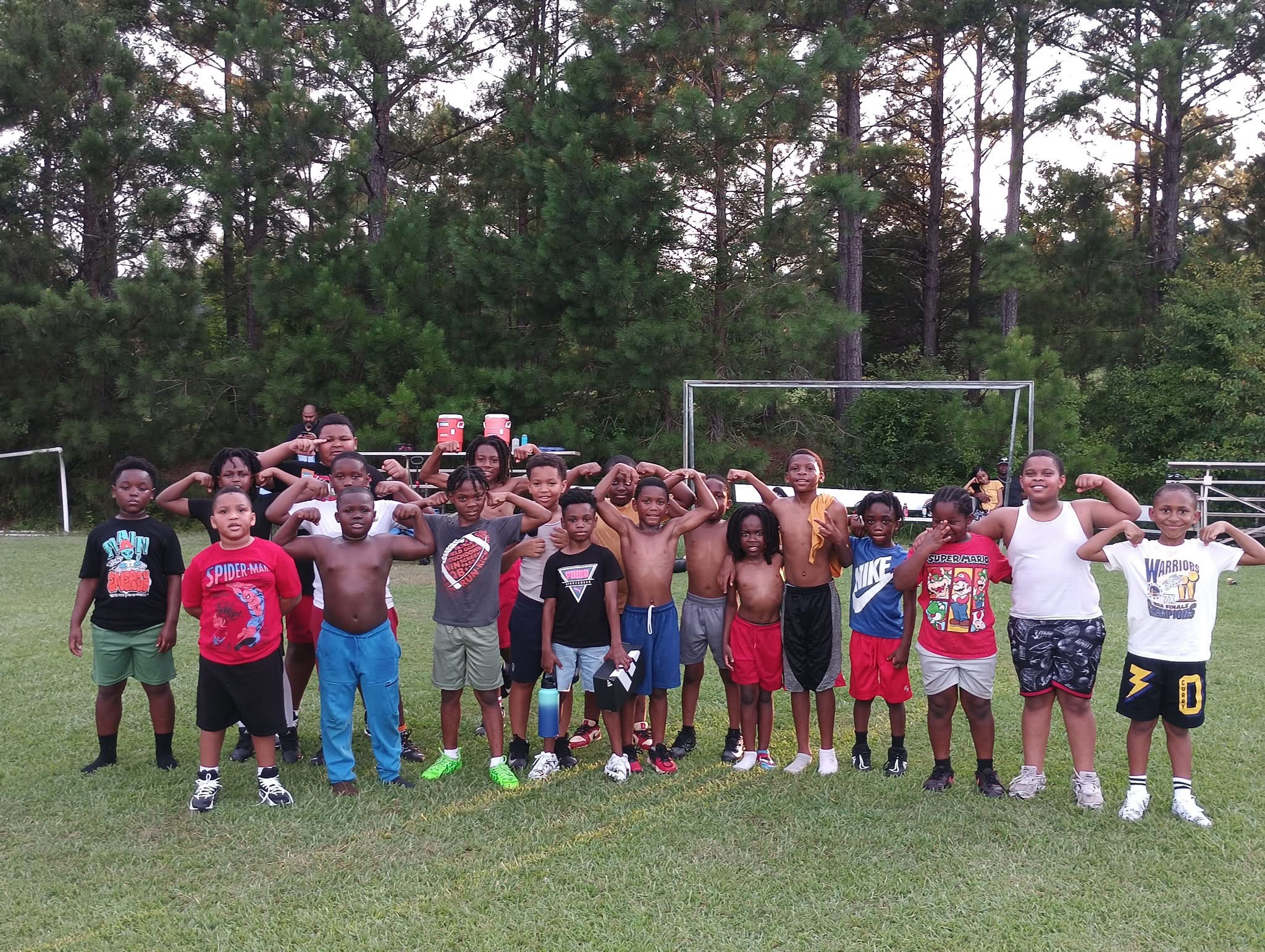 Middle Georgia Elite Bulldogs youth team with coalition mentors