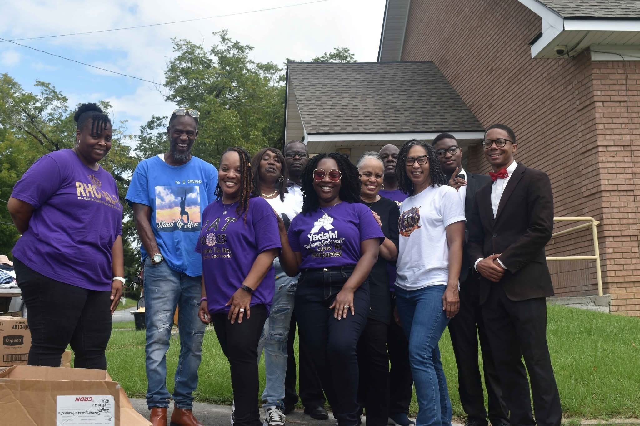 Stand Up Men volunteers serving the community